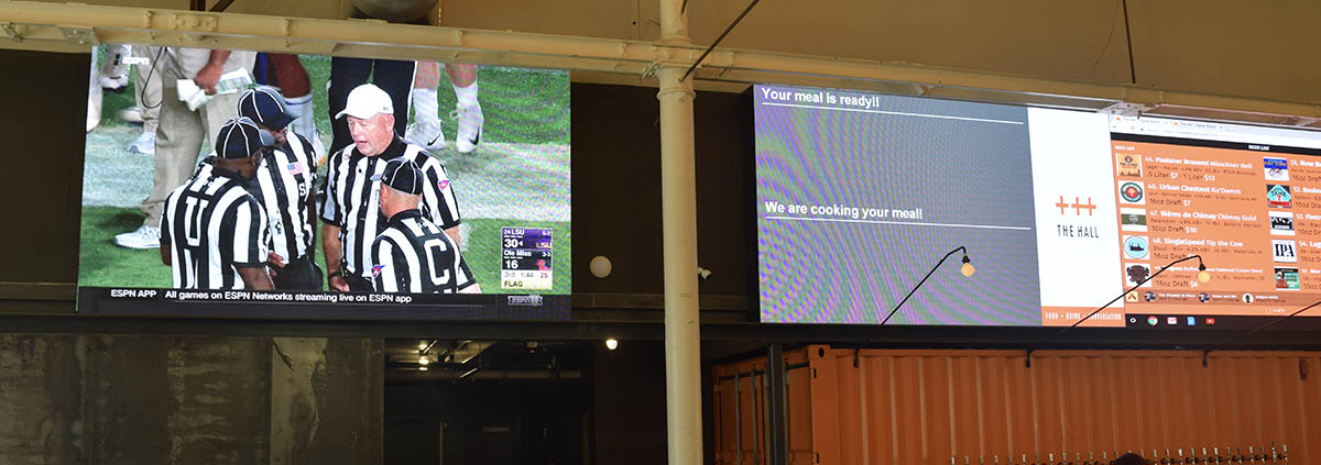 led screen rental inside of a bar in baltimore md displaying live football